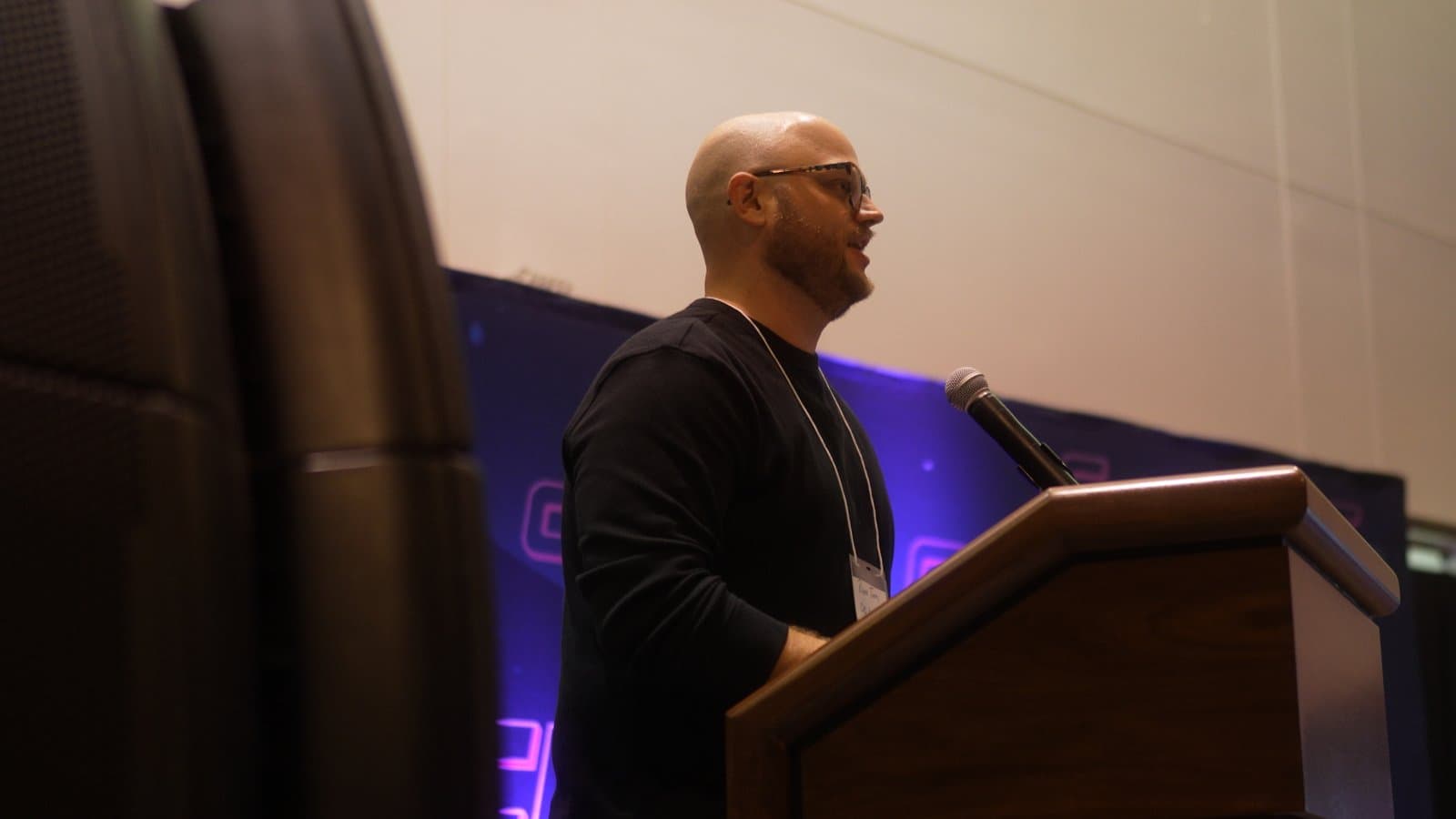 Ryan Jones at the podium during CreatorCon